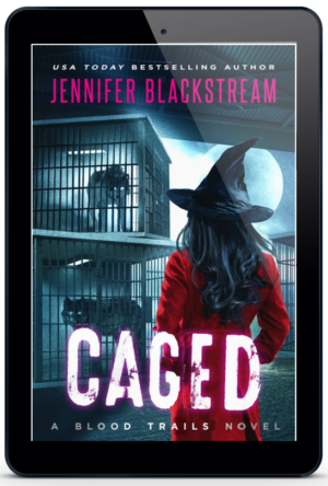 Caged, book six in Jennifer Blackstream's Blood Trails series, featured on an ereader.