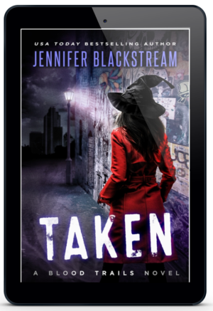 Taken, book three in Jennifer Blackstream's Blood Trails series, featured on an ereader.