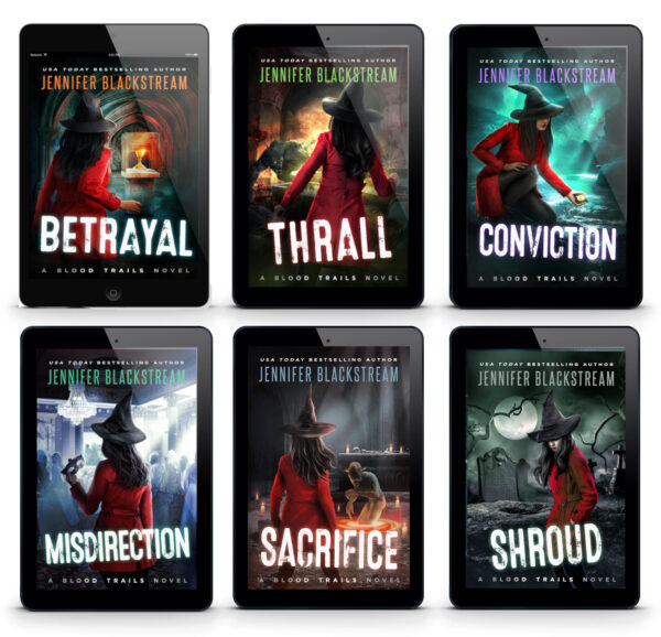 Cover art for books seven through twelve of the Blood Trails series featured on ereaders. Books include, Betrayal, Thrall, Conviction, Misdirection, Sacrifice, and Shroud.