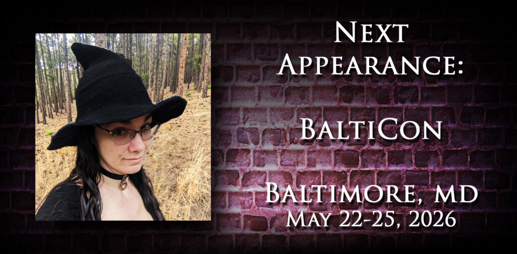A picture of Jennifer Blackstream making a weird face in the forest next to an announcement that her next appearance will be at BaltiCon in Baltimore, MD May 22 -25.